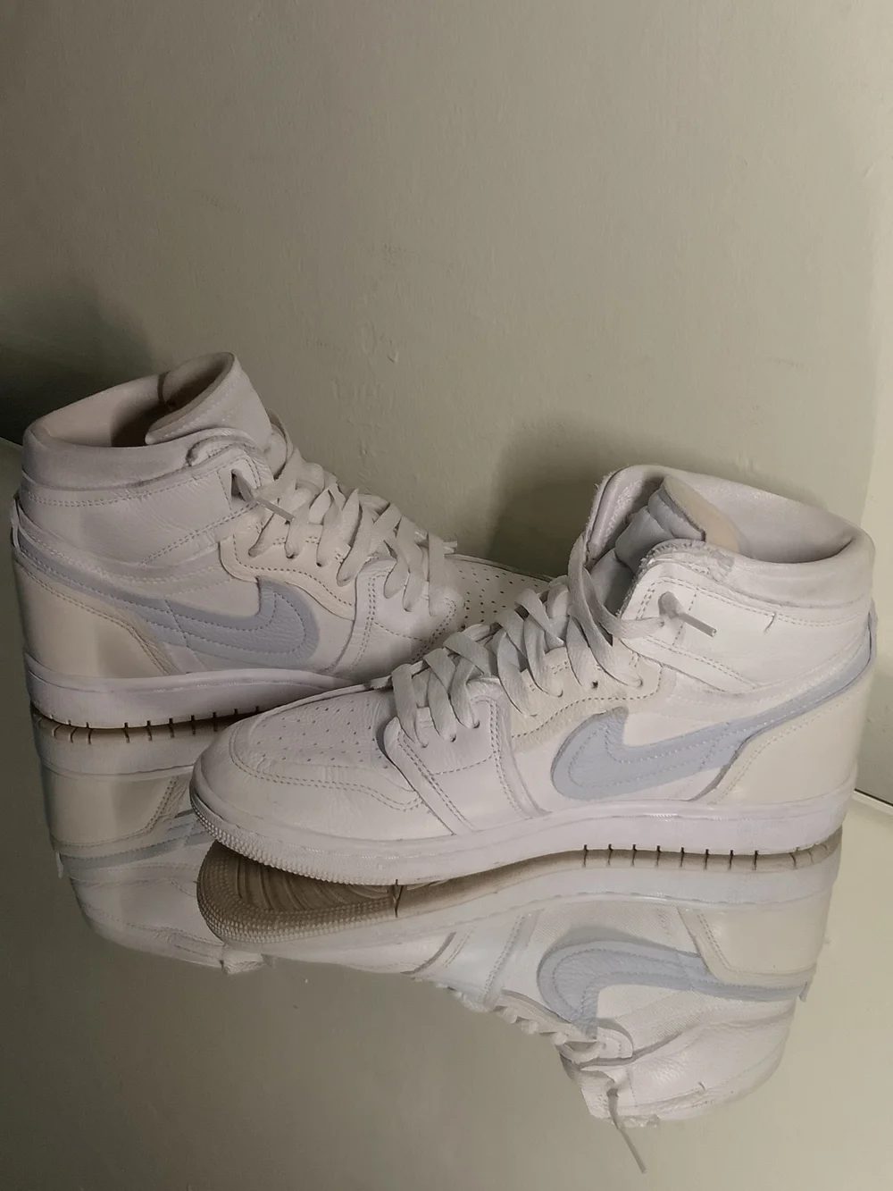 Nike Air Jordans 1 Coconut Milk. Mid-Top Sneakers in White and Light Gray